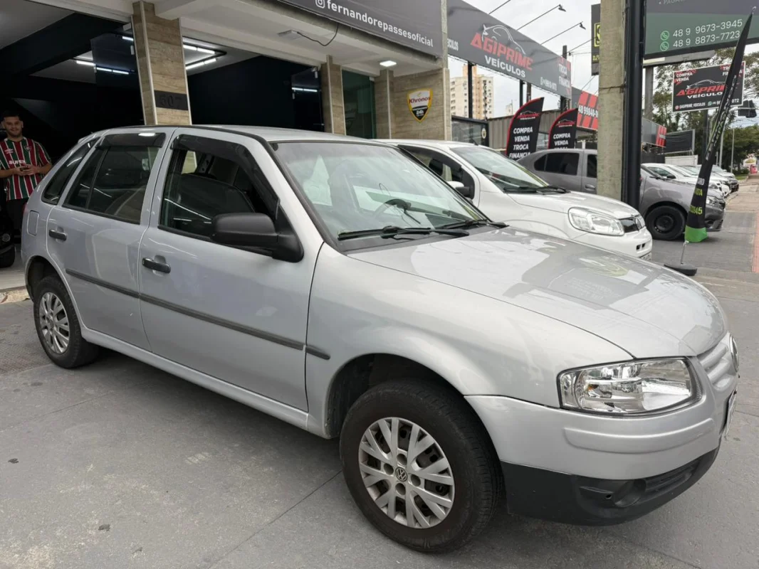 Gol 1.0 c/ar condicionado + vidro elétrico manual 2009